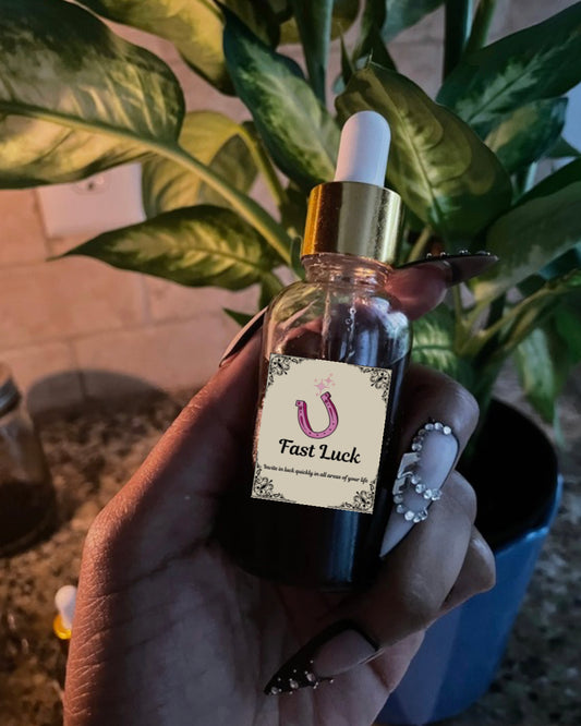 Hoodoo Dolls Fast Luck Oil